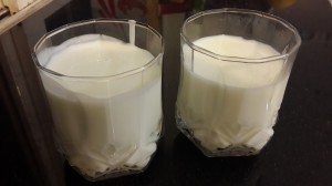 A glass of milk and a glass of buttermilk