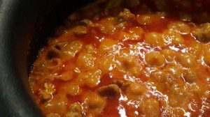 Laal maans or spicy red mutton gravy with curd